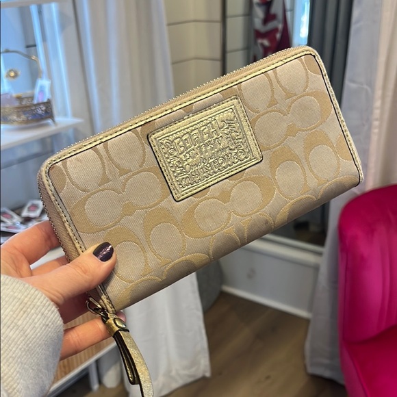 Coach Handbags - Coach Poppy Zippy Wallet Gold